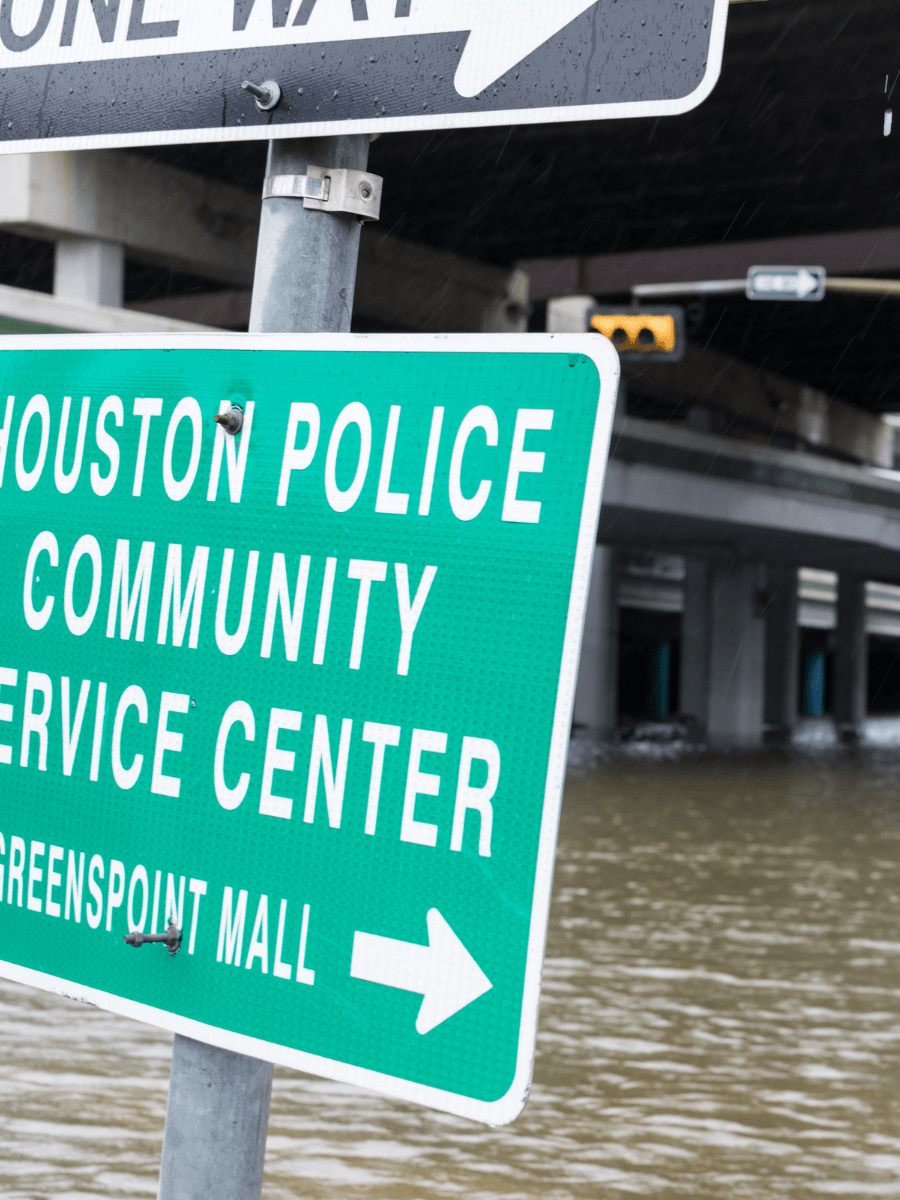 This poignant image depicts the flooded streets of a Texas town following a heavy storm.