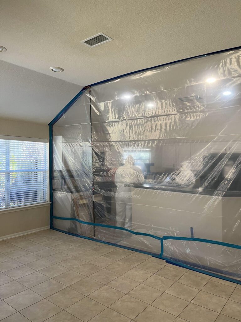 Mold removal in progress by Beacon Restoration Services team.